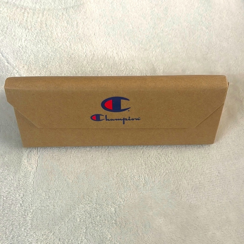 Champion sunglasses case. Brown box case with Champion logo. Magnetic closure